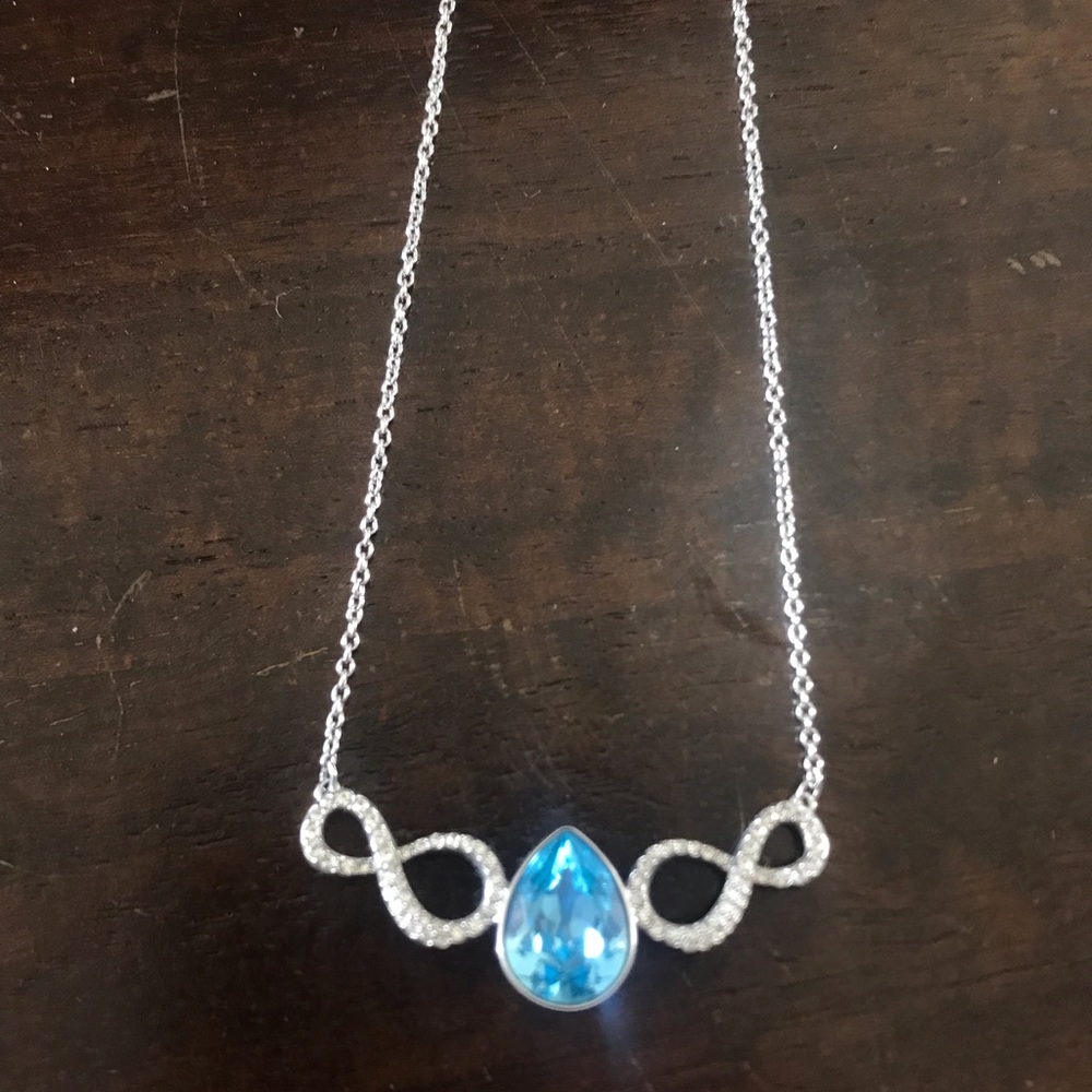 Infinity necklace with aquamarine birthstone